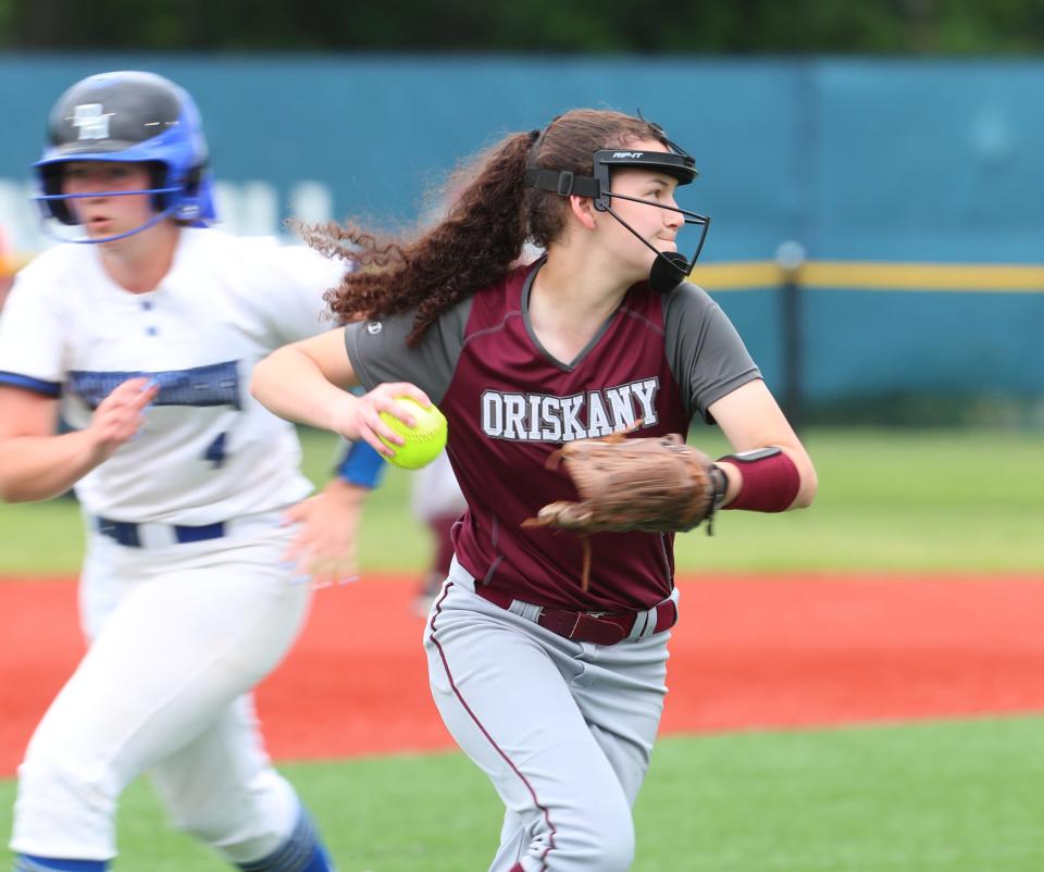 Oriskany's Ashley Reid (12) makes a throw to first in the NYSPHSAA Class D final against Deposit at Moriches Athletic Complex in Moriches on Saturday, June 11, 2022.