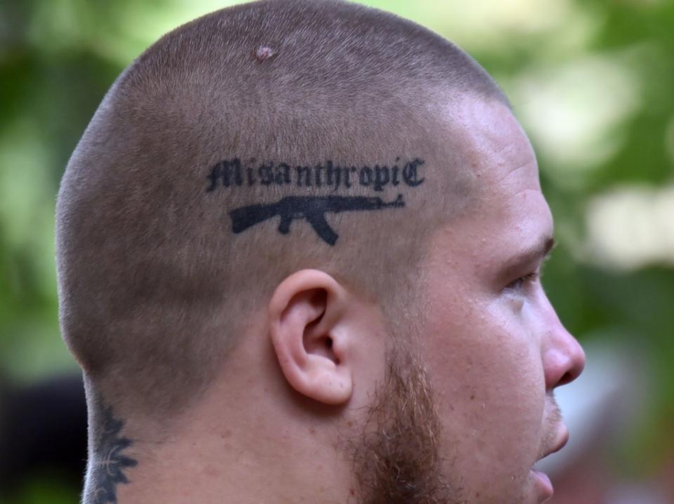 A tattooed Azov Battalion recruit in August 2015 (Sergei Supinskly/AFP/Getty)