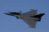 A French Air Force Dassault Rafale C jet fighter performs during the opening day of the Dubai Air Show, United Arab Emirates, Monday, Nov. 13, 2023. (AP Photo/Kamran Jebreili)