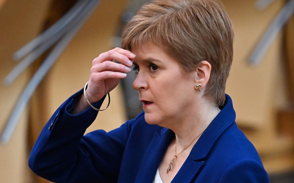 Nicola Sturgeon made the u-turn at Holyrood, leading to confusion for businesses - JEFF J MITCHELL/AFP