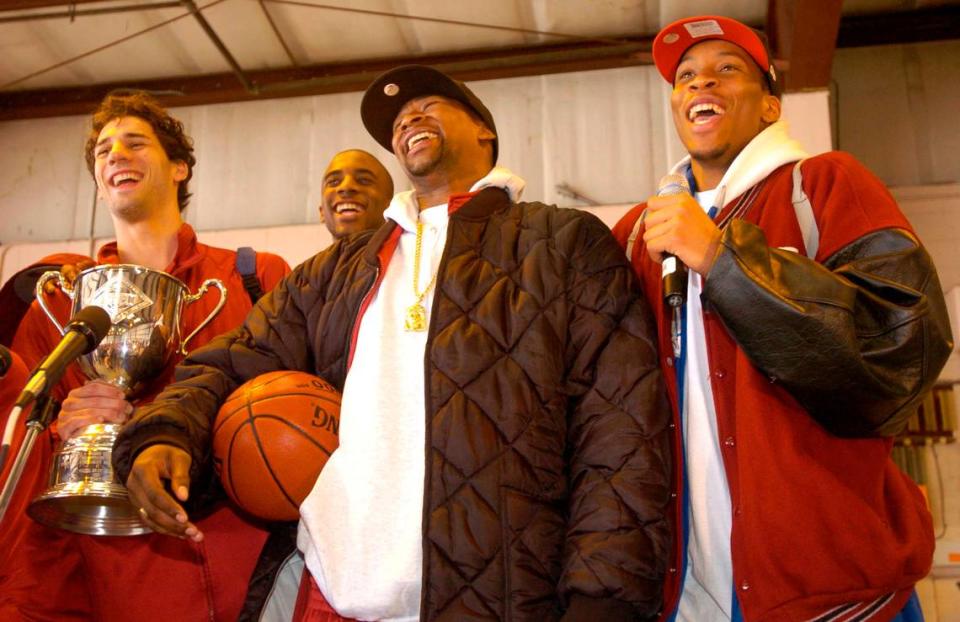 From April 1, 2005: The University of South Carolina basketball team, including from left, John Chappell, Brandon Wallace, Carlos Powell and Tarence Kinsey, address hundreds of cheering fans at Eagle Aviation after the Gameococks won the NIT.