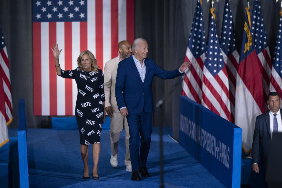 RALEIGH, NORTH CAROLINA - JUNE 28: First Lady Jill Biden, with "VOTE" printed on her dress, and U.S. President Joe Biden arrive at a post-debate campaign rally on June 28, 2024 in Raleigh, North Carolina. Last night President Biden and Republican presidential candidate, former U.S. President Donald Trump faced off in the first presidential debate of the 2024 campaign. (Photo by Allison Joyce/Getty Images)