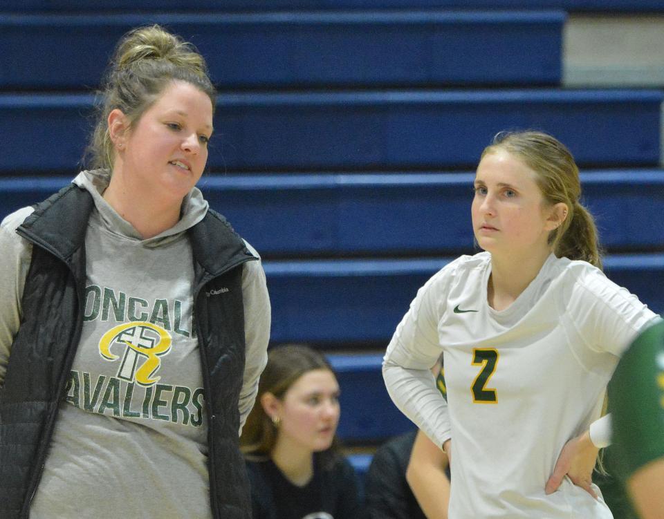 Aberdeen Roncalli volleyball coach Mandy Smid visits with Camryn Bain during a Class A SoDak 16 state-qualifying volleyball match against Dakota Valley on Tuesday, Nov. 7, 2023 at Great Plains Lutheran High School in Watertown.