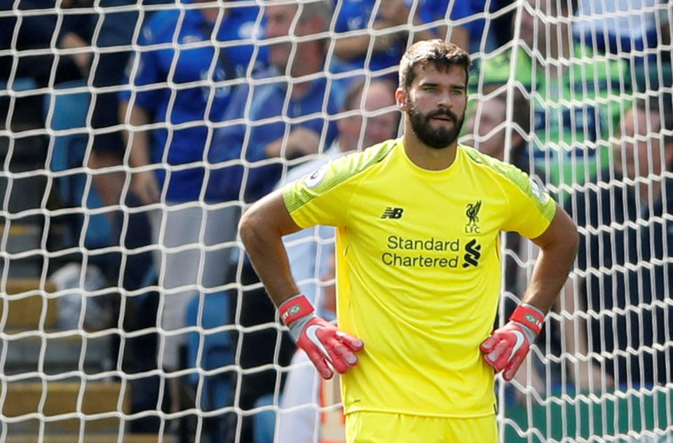 Alisson looks dejected after his mistake allowed Leicester a lifeline