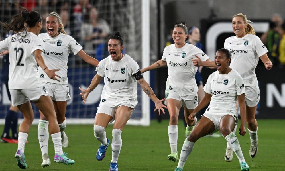 Ali Krieger and teammates celebrate after winning the NWSL final.