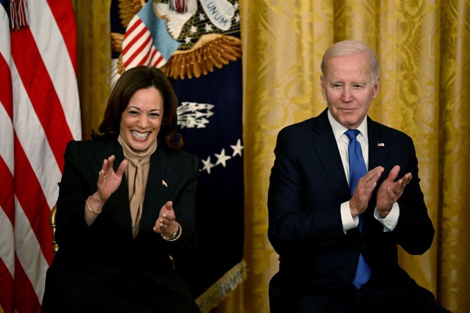 US Vice President Kamala Harris and US President Joe Biden are pictured. applaud during an event marking the 30th Anniversary of the Family and Medical Leave Act, in the East Room of the White House in Washington, DC, on February 2, 2023. (Photo by Andrew CABALLERO-REYNOLDS / AFP)