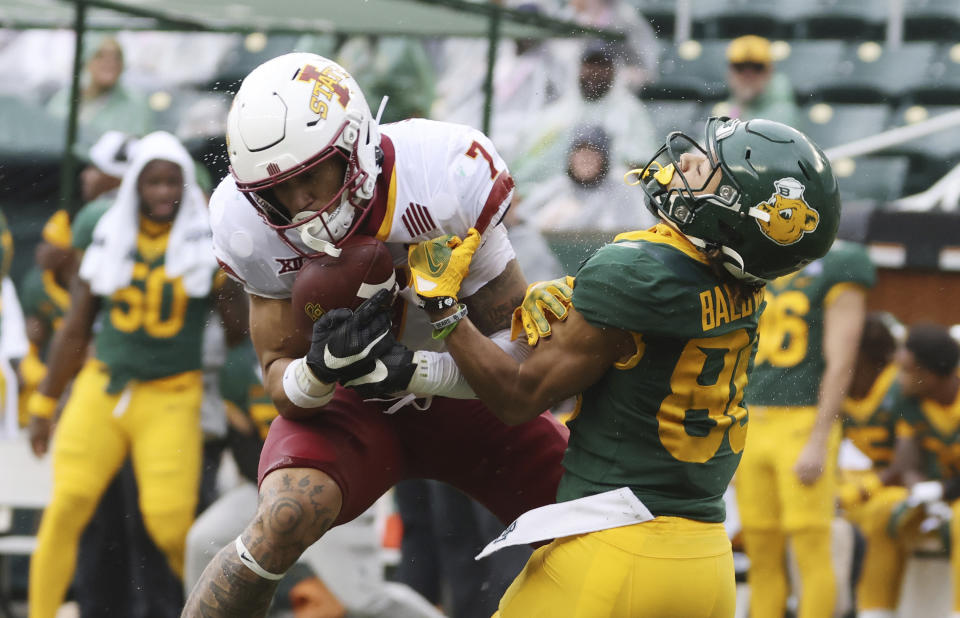 Iowa State defensive back Malik Verdon intercepts a passover Baylor wide receiver Monaray Baldwin in the first half of an NCAA college football game, Saturday, Oct. 28, 2023, in Waco, Texas. (Rod Aydelotte/Waco Tribune-Herald via AP)