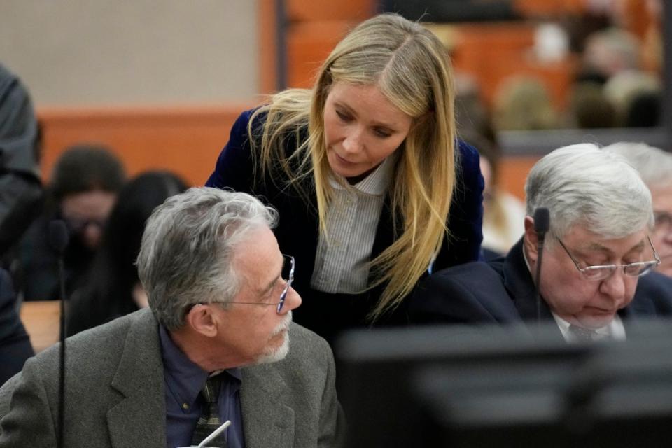 Gwyneth Paltrow speaks with retired optometrist Terry Sanderson,left, as she walks out of the courtroom following the reading of the verdict in their lawsuit trial, Thursday, March 30, 2023, in Park City, Utah (AP)