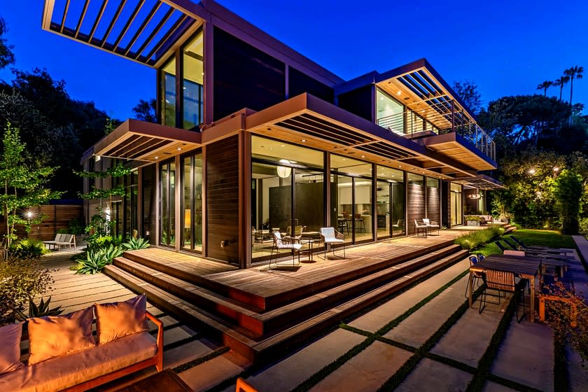 The Westside home of actor Will Arnett, listed for $10.995 million, is comprised of six modules that were built off-site and later assembled on location. Walls of glass, overhanging eaves and open-concept living spaces are among features of the home. Outside, there's tiered decking and a swimming pool.