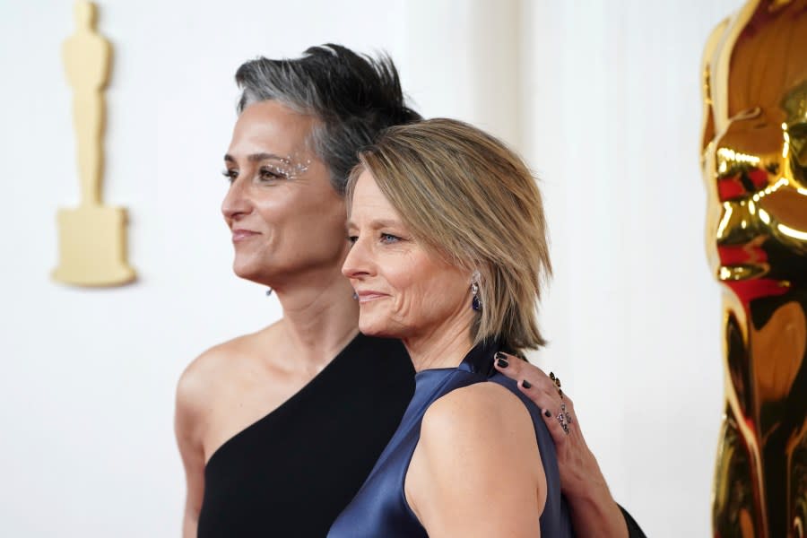 Alexandra Hedison, left, and Jodie Foster arrive at the Oscars on Sunday, March 10, 2024, at the Dolby Theatre in Los Angeles. (Photo by Jordan Strauss/Invision/AP)