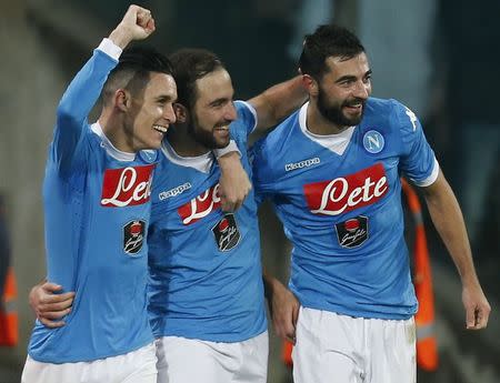 Football Soccer - Inter Milan v Napoli - Italian Serie A - San Paolo, Naples, Italy 30/11/15. Napoli's Gonzalo Higuain celebrates with teammates after scoring against Inter Milan. REUTERS/Ciro De Luca