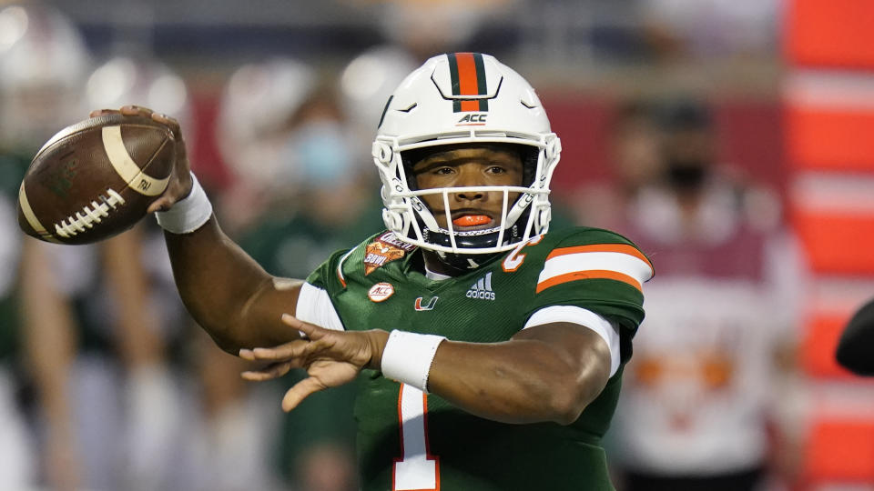 Miami quarterback D'Eriq King throws a pass during the first half of the Cheez-it Bowl NCAA college football game against Oklahoma State, Tuesday, Dec. 29, 2020, in Orlando, Fla. (AP Photo/John Raoux)