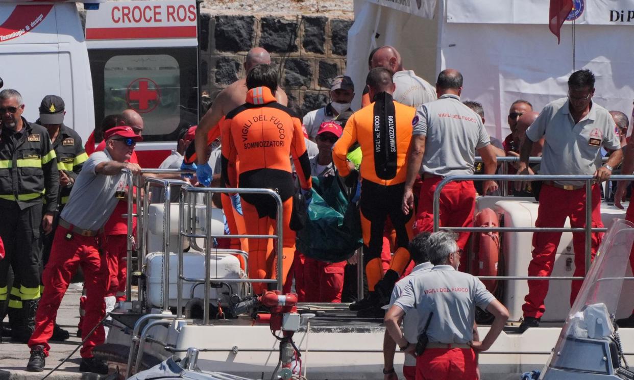 <span>Rescue workers return to port in Porticello after retrieving the body or Hannah Lynch from the Bayesian.</span><span>Photograph: Jonathan Brady/PA</span>