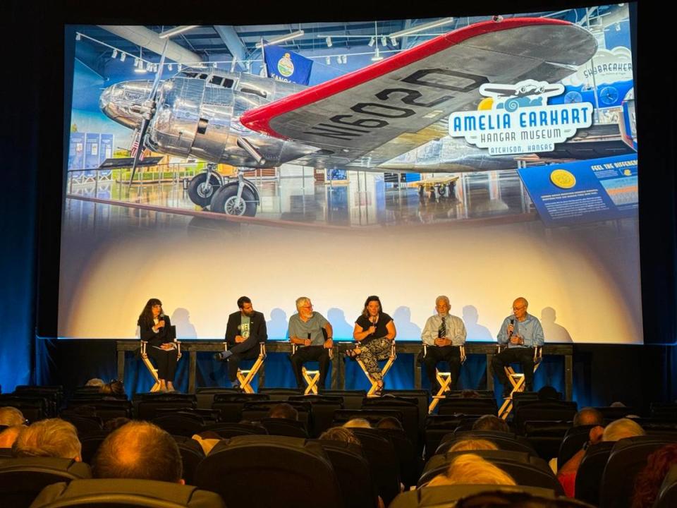 Speakers spoke before a crowd at the Fox Theatre.  From the disappearance itself to the possible discovery of Earhart's plane, panelists discussed every aspect of the pilot's disappearance.