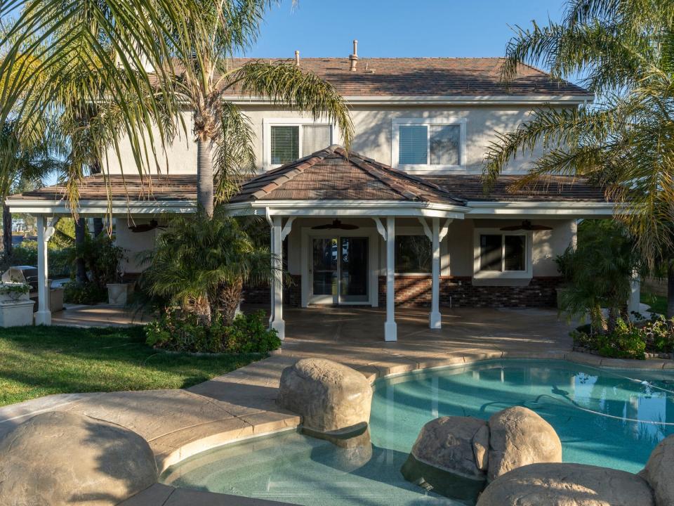 A back patio of a house.