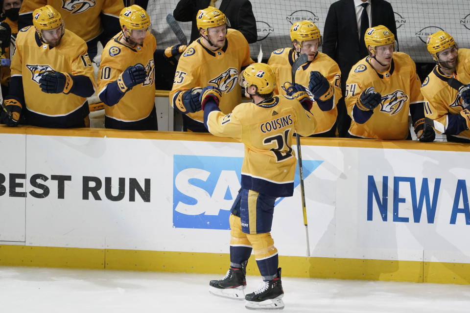 Nashville Predators center Nick Cousins (21) celebrates after scoring a goal against the Carolina Hurricanes during the third period in Game 4 of an NHL hockey Stanley Cup first-round playoff series Sunday, May 23, 2021, in Nashville, Tenn. (AP Photo/Mark Humphrey)