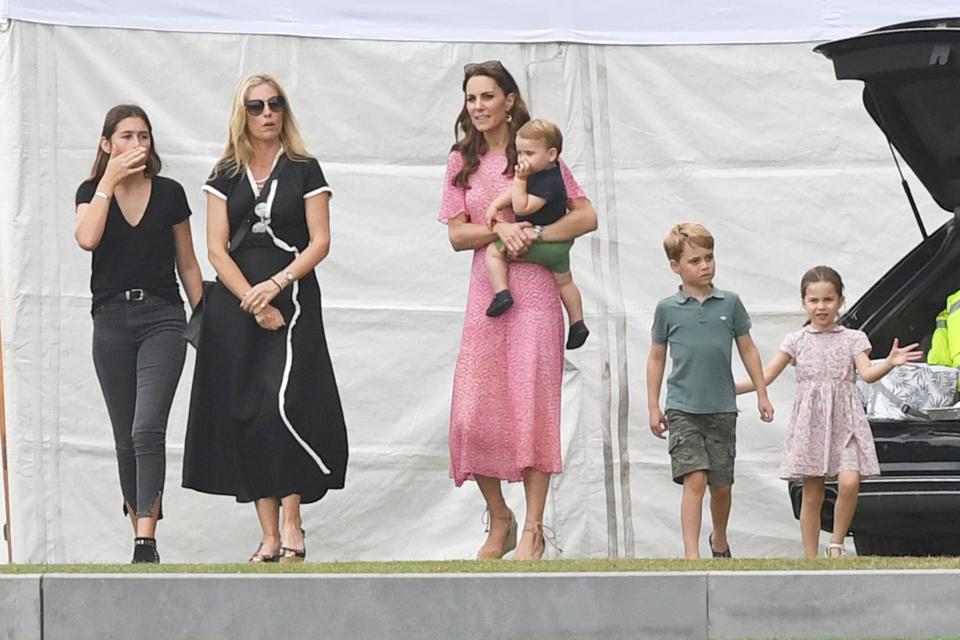 Kate and her kids get ready to head out. 