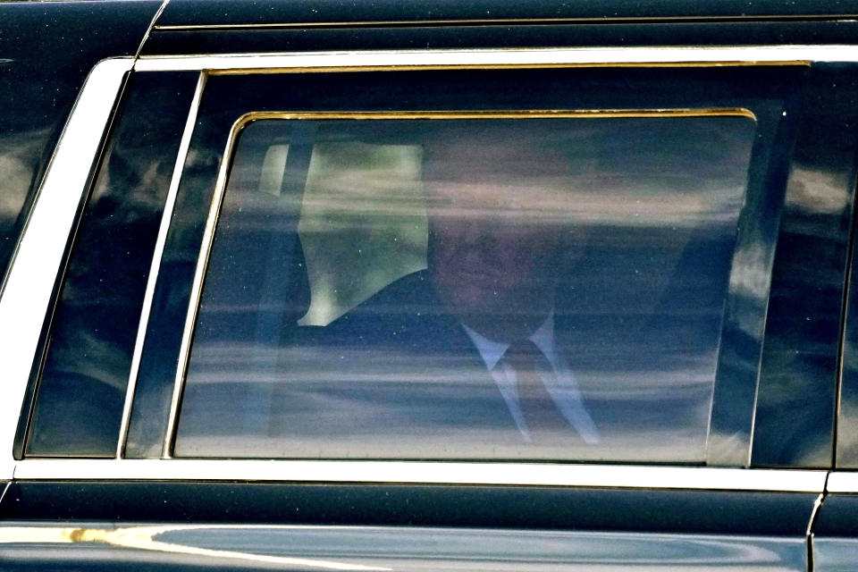 Former President Donald Trump waves to supporters as he leaves federal court, Thursday, March 14, 2024, in Fort Pierce, Fla. (AP Photo/Wilfredo Lee)