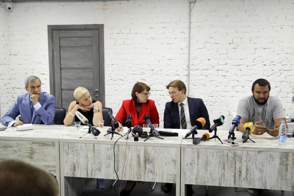 Belarusian opposition activists, members of the coordinating council, from the left, Pavel Latushko, Maria Kolesnikova, Olga Kovalkova, Maxim Znak, Sergey Dylevsky attend a joint news conference in Minsk, Belarus, Tuesday, Aug. 18, 2020. The opposition is creating the Coordination Council to discuss the transition of power. (AP Photo/Sergei Grits)