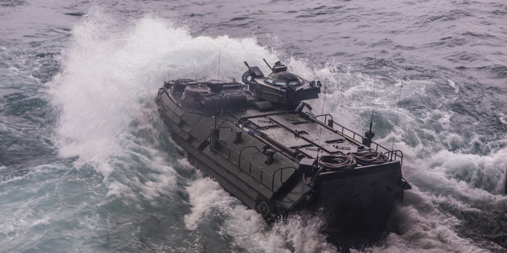 An assault amphibious vehicle after exiting the well deck of an amphibious dock landing ship.