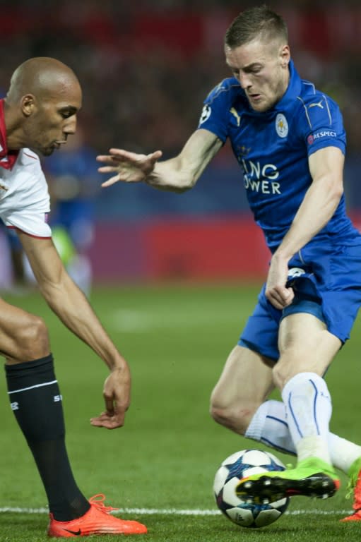 Sevilla's Steven N'Zonzi (L) fights for the ball with Leicester City's Jamie Vardy during their UEFA Champions League round of 16 1st leg match, at the Ramon Sanchez Pizjuan stadium in Sevilla, on February 22, 2017