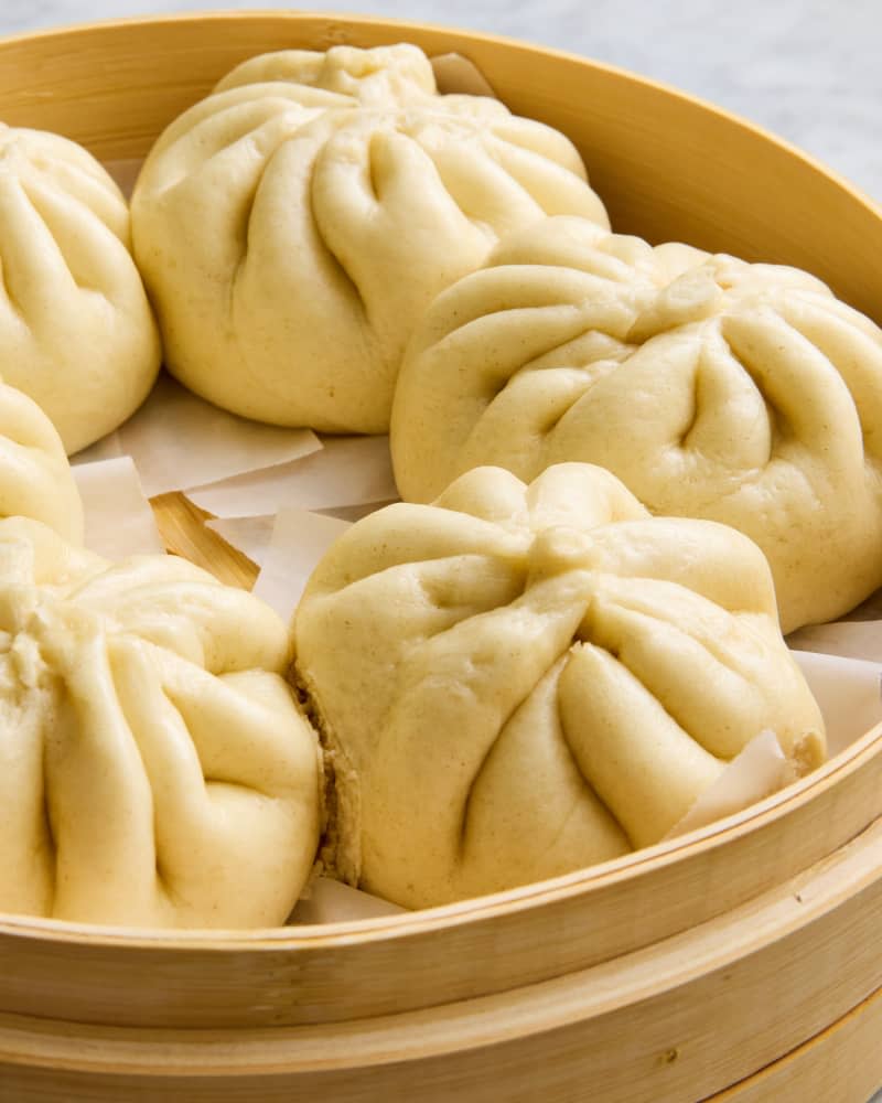 steamed buns in steamer basket