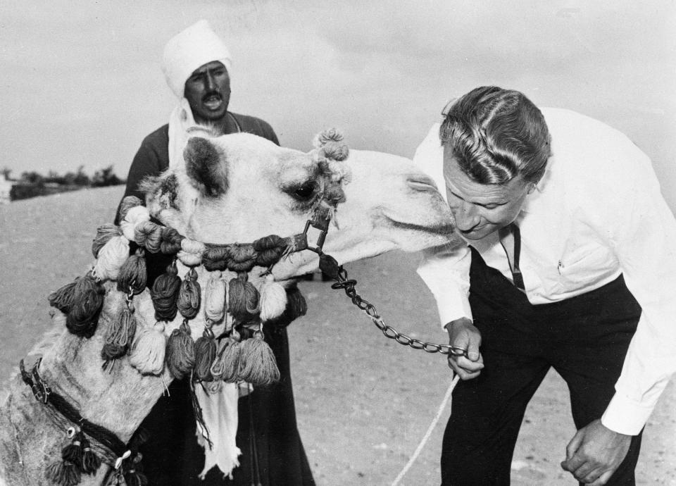 <p>A camel salutes Billy Graham during a visit to the Egyptian pyramids and to the Sphinx on March 14, 1960. (Photo: AP) </p>