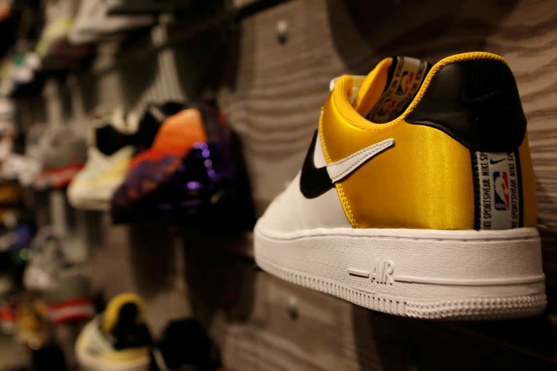 FILE PHOTO: A pair of Nike's Air Force shoes with a NBA logo are seen display at a Nike store in Beijing