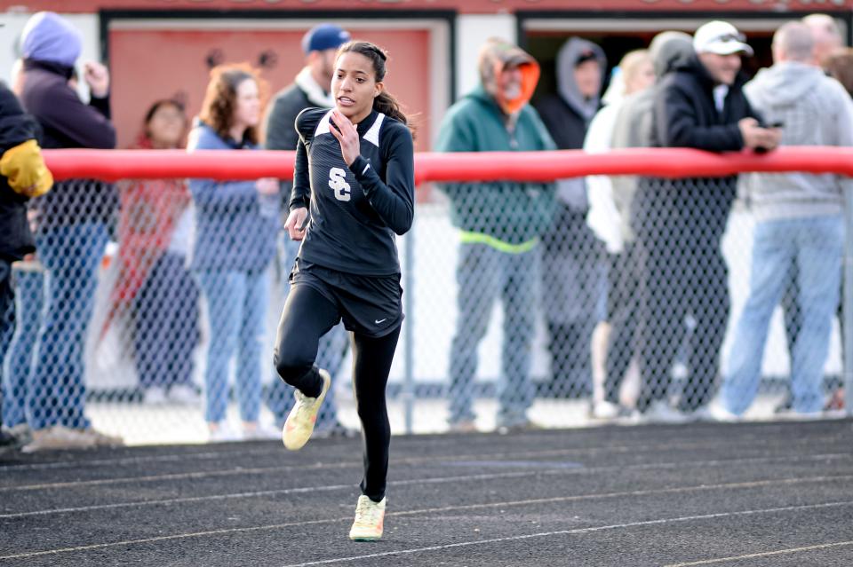 Williams runs the curve in the 400 meters at this year's Crestview Pruner Invitational.