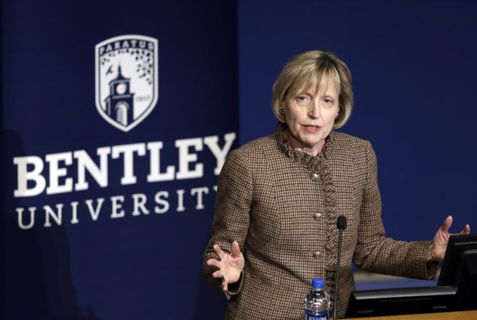 FILE - In this March 5, 2019, file photo, Bentley University President Alison Davis-Blake speaks during an event on campus in Waltham, Mass. After a decade of booming enrollment by students from China, American universities are starting to see steep declines as political tensions between the two countries cut into a major source of tuition revenue. “We’ve been very intentional about knowing that a drop-off was coming and really broadening our international and domestic footprint,” Davis-Blake said. (AP Photo/Elise Amendola, File)