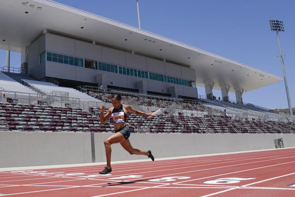 Allyson Felix crosses the finish line during the women's 3x100-meter relay at the Weltklasse Zürich "Inspiration Games".