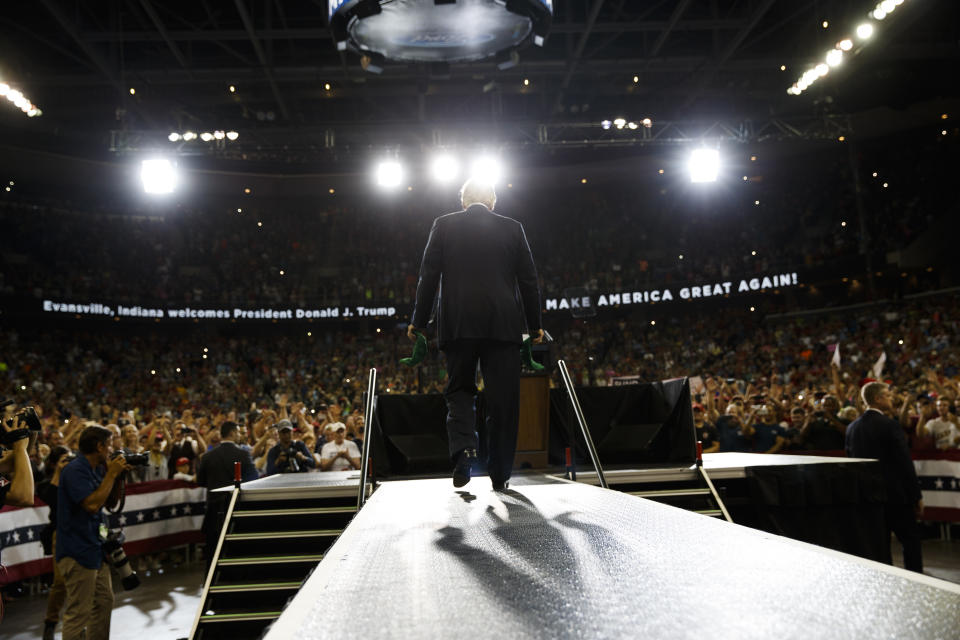 President Donald Trump arrives for a campaign rally at the Ford Center, Thursday, Aug. 30, 2018, in Evansville, Ind. (AP Photo/Evan Vucci)