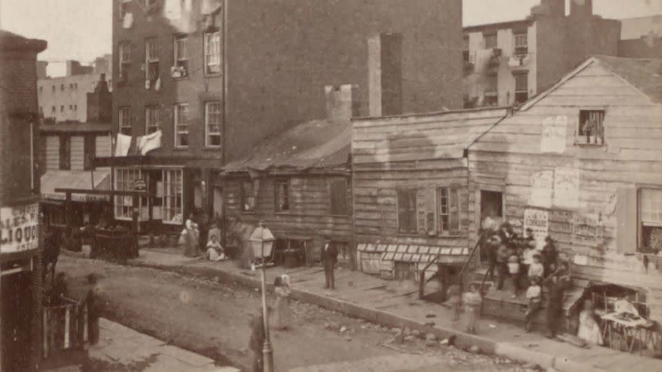 This historic photo shows New York City's Five Points neighborhood in 1875. At the time, the neighborhood was home to the more Irish immigrants than any other part of the city. - From The New York Public Library