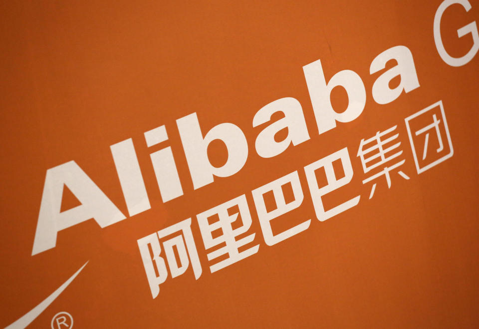 FILE - In this Sept. 19, 2014, photo, the Alibaba logo is displayed during the company's IPO at the New York Stock Exchange. The U.S. and China have reached a preliminary agreement to allow U.S. regulators to inspect the audits of China-based companies whose stocks are traded on U.S. exchanges. The deal was announced Friday, Aug. 26, 2022. (AP Photo/Mark Lennihan, File)