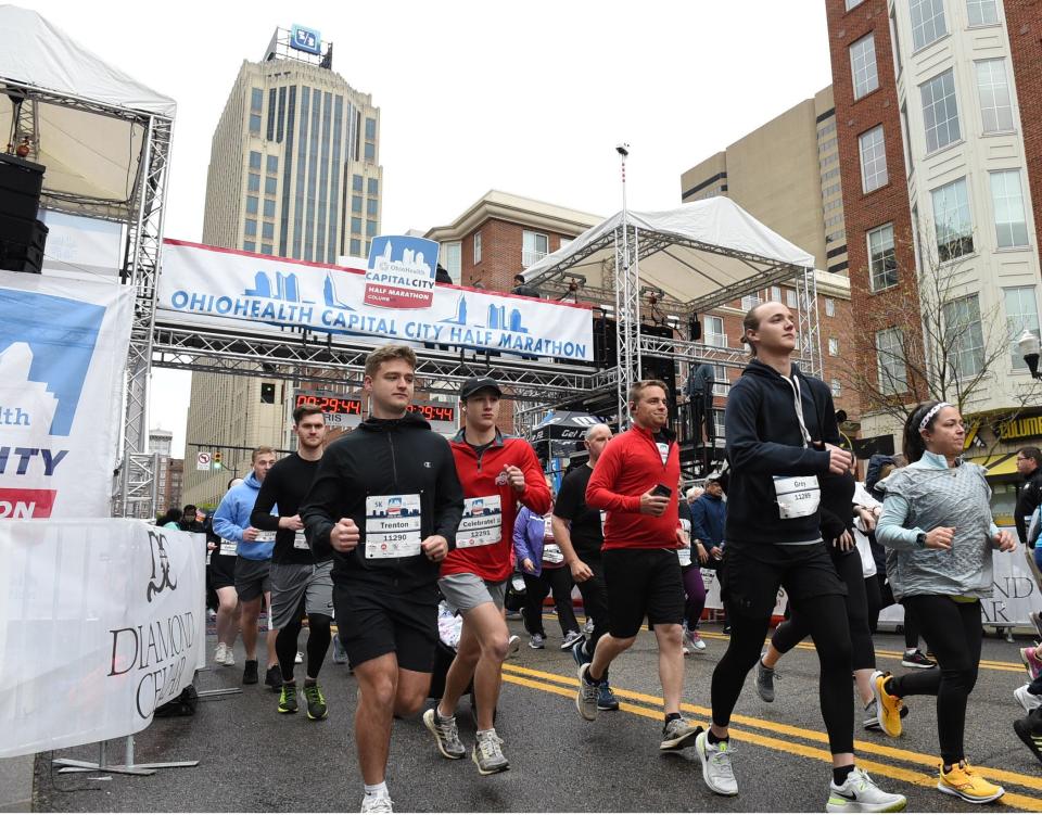 Participants run in the 2022 OhioHealth Capital City Half Marathon. This year's event takes place Downtown on Saturday.