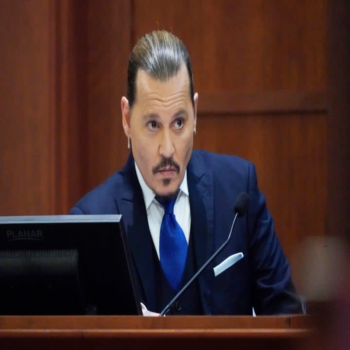 Johnny Depp sits in court