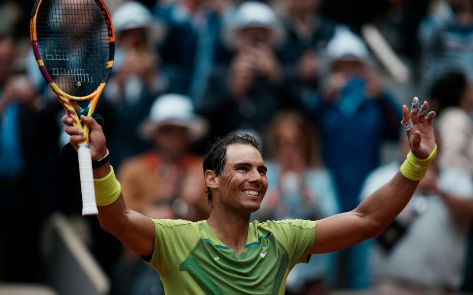 Nadal waves to the crowd at the end of the match - AP