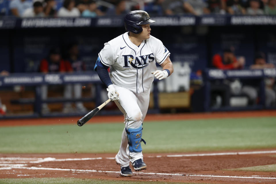 Tampa Bay Rays' Ji-Man Choi runs to first after hitting an RBI single against the Boston Red Sox during the first inning of a baseball game Wednesday, July 13, 2022, in St. Petersburg, Fla. (AP Photo/Scott Audette)