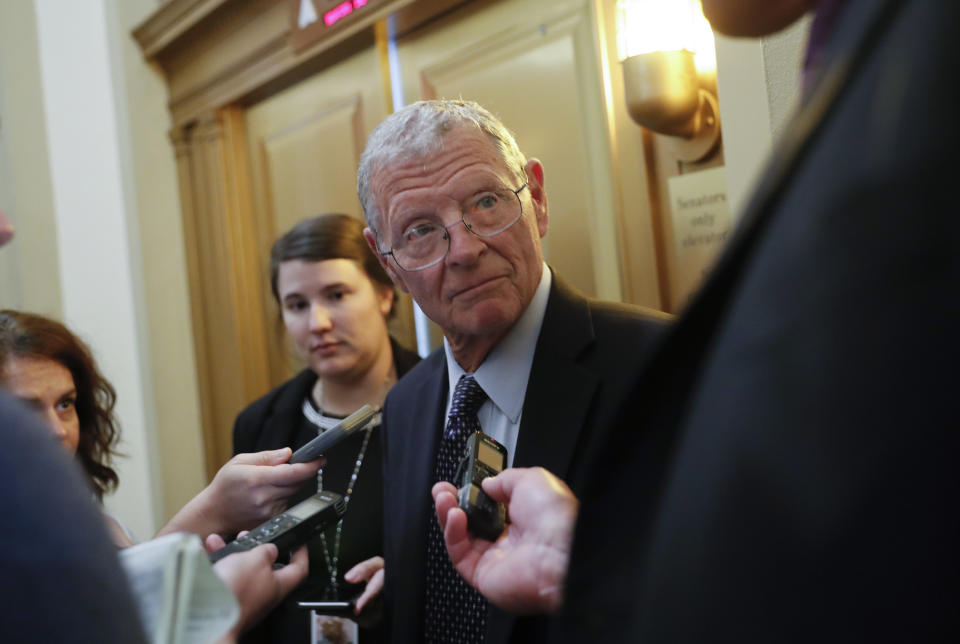 FILE - Sen. James Inhofe, R-Okla., stops to speak to members of the media at the Capitol in Washington, Aug. 28, 2018. Sen. Inhofe, a conservative firebrand known for his strong support of defense spending and his denial that human activity is responsible for the bulk of climate change, has died Tuesday, July 9, 2024. He was 89. (AP Photo/Pablo Martinez Monsivais, file)