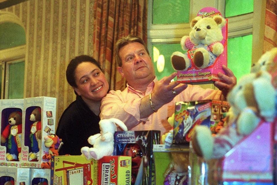 Three Legs pub Karaoke presenter 'Big Jackie' and landlord Geoff Rose display the toys for for donation to Leeds hospitals in December 1999. (Photo: Dan Oxtoby)