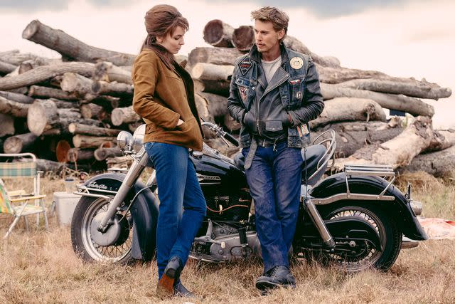 <p>Kyle Kaplan/Focus Features</p> Jodie Comer and Austin Butler in 'The Bikeriders.'