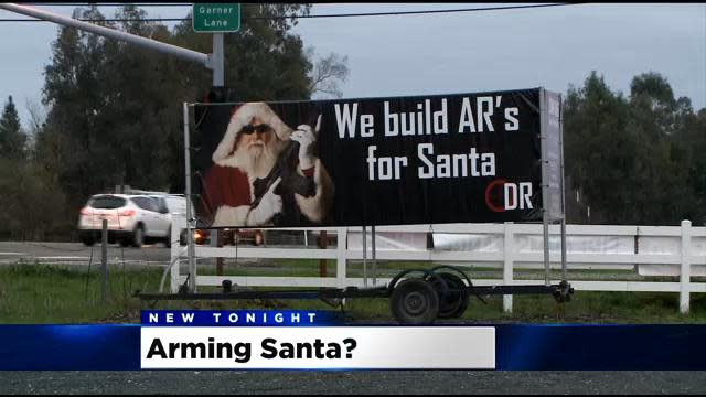 Gun-toting Santa billboard causes controversy