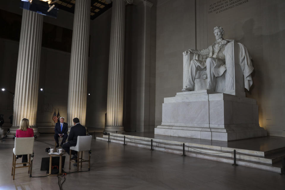 WASHINGTON, DC - MAY 03: President Donald Trump (C) speaks with news anchors Martha MacCallum (L) and Bret Baier (R) during a Virtual Town Hall inside of the Lincoln Memorial on May 3, 2020 in Washington, DC. (Photo by Oliver Contreras-Pool/Getty Images)