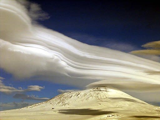 Photo of Mount Erebus volcano in McMurdo Sound, Antarctica. An Australian government jet carrying a medical team made a successful landing on an icy runway in Antarctica Thursday to rescue a sick scientist from the United States' McMurdo Station base