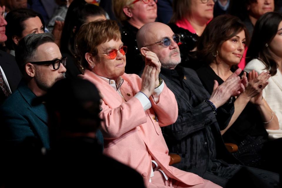 During the performance, which took place at Washington, DC’s DAR Constitution Hall, both John, 77, and his longtime collaborator Taupin, 73, were seen smiling and waving their hands in the air. Kevin Mazur/Getty Images