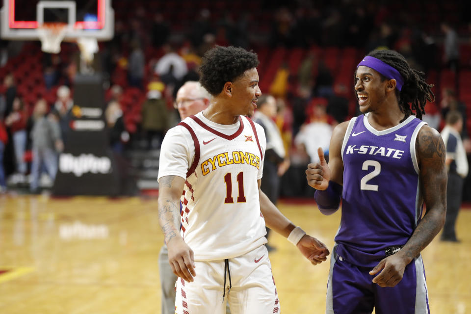 Iowa State guard Prentiss Nixon, left, and Kansas State guard Cartier Diarra laugh as they walk off the court following Iowa State's 73-63 win over Kansas State in an NCAA college basketball game Saturday, Feb. 8, 2020, in Ames, Iowa. (AP Photo/Matthew Putney)