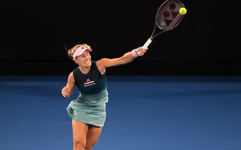 Germany's Angelique Kerber hits a return against Australia's Kimberly Birrell during their women's singles match on day five of the Australian Open tennis tournament in Melbourne on January 18, 2019 - Credit: AFP