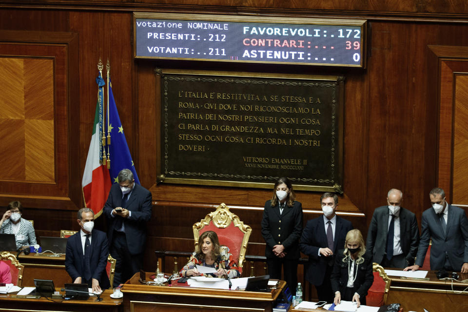 President of the Senate Maria Elisabetta Alberti Casellati, center, reads out the vote result at the Senate, in Rome, Thursday, July 14, 2022. Premier Mario Draghi won a confidence vote in the Senate on Thursday but the future of his government was in doubt after the 5-Star Movement boycotted the vote, throwing his coalition into crisis. The vote was 172-39, but 5-Stars senators were absent after confirming they wouldn’t participate in a vote on a relief bill for soaring energy costs. (Roberto Monaldo/LaPresse via AP)