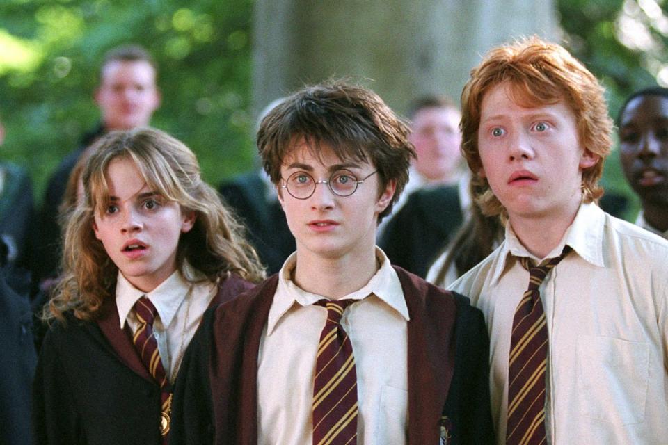 Rowling’s Harry Potter novels were adapted into a string of hit films starring Emma Watson, Daniel Radcliffe and Rupert Grint (Warner Bros)