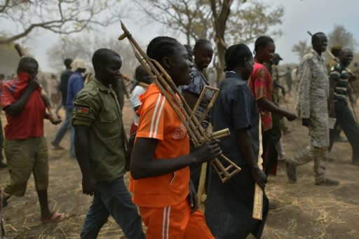 AFP visited a camp to bring soldiers and former rebels together in a unified army, and found trainees using wooden rifles and lacking food and sanitation